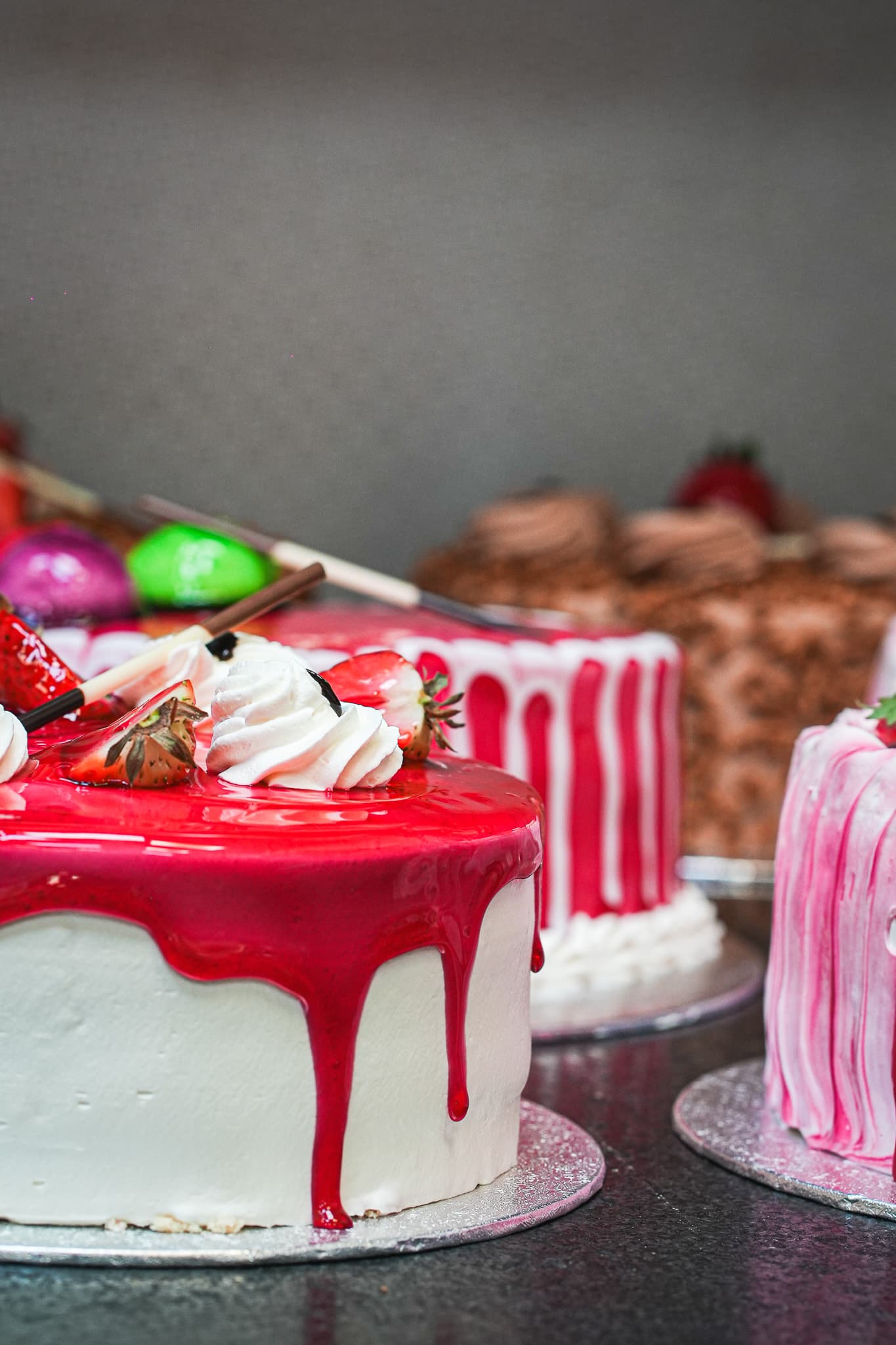 Red glaze celebration cake with fresh cream and strawberry decoration